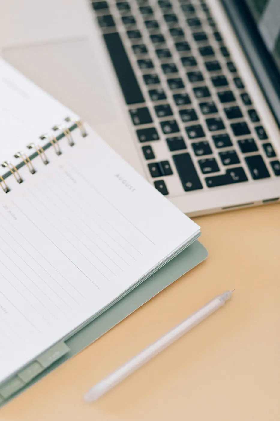 Illustrative still life of a desk and notebook